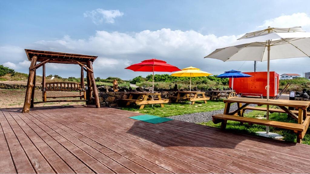 Jeju Woljeongri Pungcha Pension (제주 월정리풍차 펜션): Charming Seaside Stay
